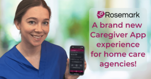 female caregiver in blue scrubs holding a cell phone featuring the new Rosemark caregiver app